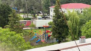an aerial view of a playground in a park at Tatas Place in Batumi +3 photos