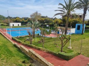 Bazén v ubytování Cabo Negro-Les Jardins de Cabo Negro nebo v jeho okolí
