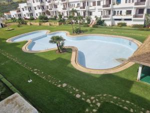 Bazén v ubytování Cabo Negro-Les Jardins de Cabo Negro nebo v jeho okolí