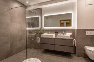 Vannituba majutusasutuses Apartment Seeglück am Walchsee - sehr stylisch, zentral und neuerbaut