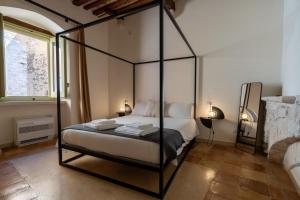 Postel nebo postele na pokoji v ubytování B&B Palazzo Vittoria
