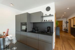 Köök või kööginurk majutusasutuses Apartment Seeglück am Walchsee - sehr stylisch, zentral und neuerbaut