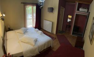 Postel nebo postele na pokoji v ubytování Guesthouse Sinoi