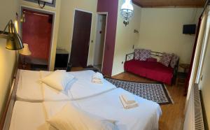 Postel nebo postele na pokoji v ubytování Guesthouse Sinoi