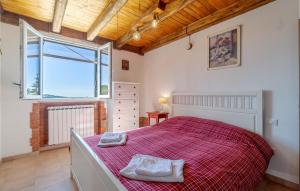 Ένα ή περισσότερα κρεβάτια σε δωμάτιο στο Cataverna