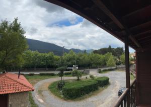 a view of a garden from a house at Guesthouse Sinoi in Vitina