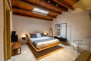Postel nebo postele na pokoji v ubytování B&B Palazzo Vittoria