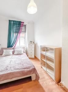 Ένα ή περισσότερα κρεβάτια σε δωμάτιο στο Gdańsk Śródmieście ul Sempołowskiej