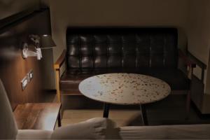 Ein Sitzbereich in der Unterkunft Just live inn - New Dahua