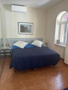Voodi või voodid majutusasutuse Private Villa Sea VIEW CON TERRAZZA E GIARDINO toas