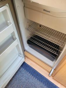Kuchyň nebo kuchyňský kout v ubytování Blankaholm husvagn Knaus