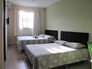 Ένα ή περισσότερα κρεβάτια σε δωμάτιο στο RCM Vilas - Studio n 10
