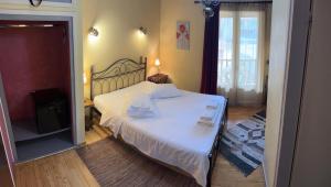 Postel nebo postele na pokoji v ubytování Guesthouse Sinoi