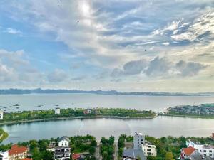 an island in the middle of a large body of water at Homestay Hạ Long 3 phòng ngủ view biển in Ha Long