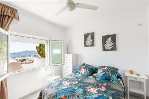 Ένα ή περισσότερα κρεβάτια σε δωμάτιο στο Casa Capricho