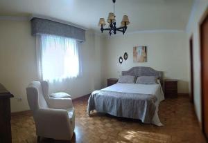 Postel nebo postele na pokoji v ubytování Puerto de Bueu, Centro