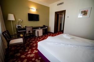 Voodi või voodid majutusasutuse Hotel Relax Craiova toas