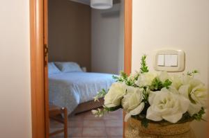 Postel nebo postele na pokoji v ubytování RITA LITTLE HOUSE + 16 fotografií