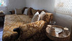 a living room with a couch and a table at Vila Kruna in Pirot