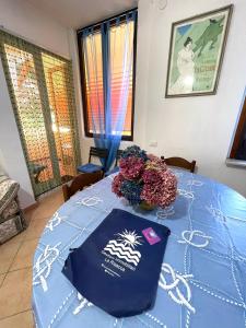 Letto o letti in una camera di La Casa dei Nodi - Santa Teresa di Gallura