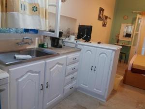 A kitchen or kitchenette at Panormos,Irene's Studio
