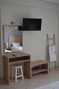 TV a/nebo společenská místnost v ubytování Rondo's Hotel