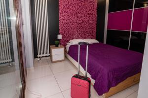 Posteľ alebo postele v izbe v ubytovaní Triton Apartments