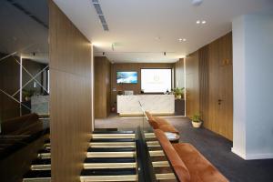 TV o dispositivi per l'intrattenimento presso Charm Hotel