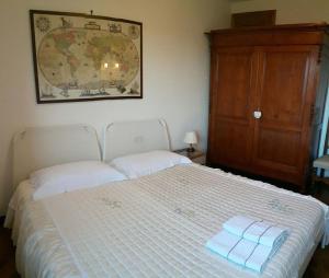 Letto o letti in una camera di Casa Leonardo
