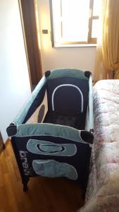 Letto o letti in una camera di Casa Leonardo