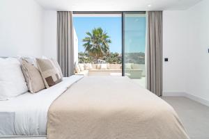 Ένα ή περισσότερα κρεβάτια σε δωμάτιο στο LAQ75 - Beautiful apartment with stunning view +55 φωτογραφίες