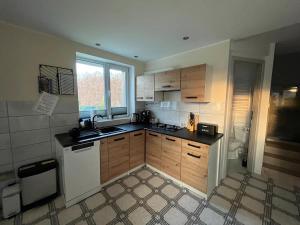 Kuchyň nebo kuchyňský kout v ubytování Apartament „Pod Zielonym Dachem”