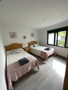 Postel nebo postele na pokoji v ubytování Casa Yanira