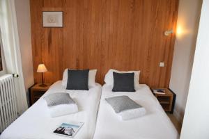 Łóżko lub łóżka w pokoju w obiekcie Chalet L Olan 15p Emplacement exceptionnel grand terrain