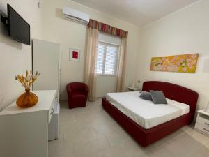 Postel nebo postele na pokoji v ubytování B&B Cafe' Fausu