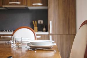 Gallery image of L'Arco - Apartment in historic center in Lesa +17 photos