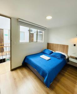 Postel nebo postele na pokoji v ubytování Hotel Botaniko
