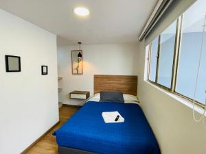 Postel nebo postele na pokoji v ubytování Hotel Botaniko + 20 fotografií