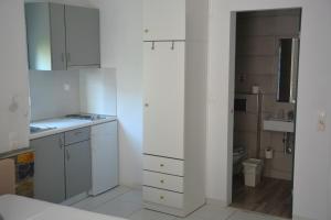 Kuchyňa alebo kuchynka v ubytovaní Virginia Rooms