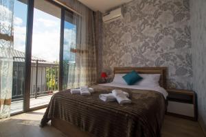 Postel nebo postele na pokoji v ubytování Prestige Guest House