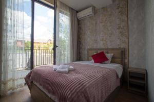 Postel nebo postele na pokoji v ubytování Prestige Guest House