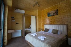 Postel nebo postele na pokoji v ubytování Prestige Guest House