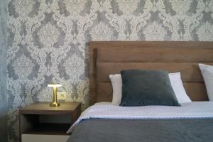 Postel nebo postele na pokoji v ubytování Prestige Guest House