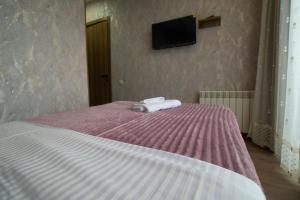 Postel nebo postele na pokoji v ubytování Prestige Guest House
