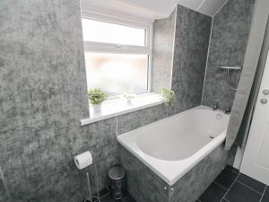 Et badeværelse på Corner Cottage + 22 billeder