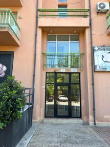 an entrance to a building with a glass door at Nesebar City Apartment in Nesebar +24 photos