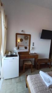 Ένα ή περισσότερα κρεβάτια σε δωμάτιο στο Hotel Beach Amaryllis