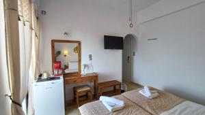 Ένα ή περισσότερα κρεβάτια σε δωμάτιο στο Hotel Beach Amaryllis