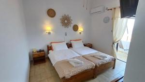 Postel nebo postele na pokoji v ubytování Hotel Beach Amaryllis