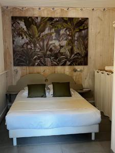 Кровать или кровати в номере Hotel Cote et Lac